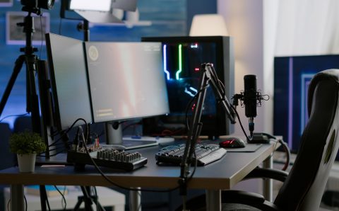 Empty streaming studio with RGB led lights powerful personal computer
