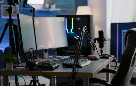 Empty streaming studio with RGB led lights powerful personal computer