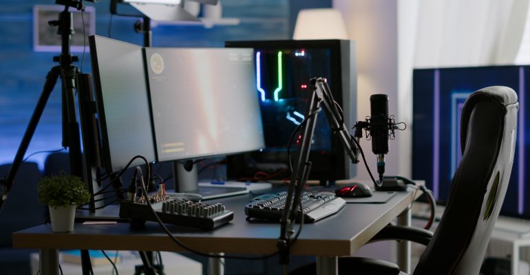 Empty streaming studio with RGB led lights powerful personal computer