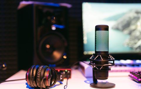 Microphone on studio blurred colorful background