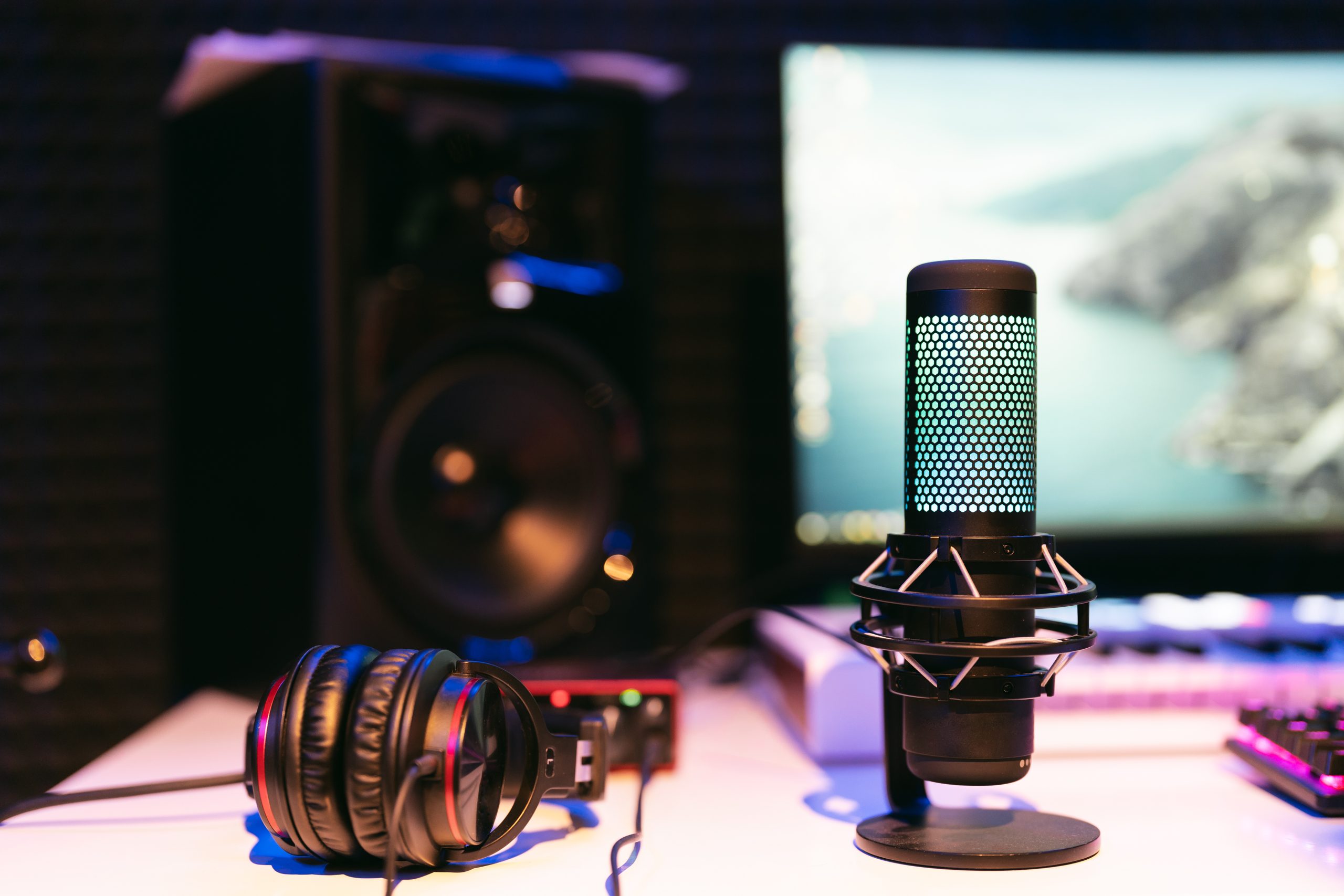 Microphone on studio blurred colorful background